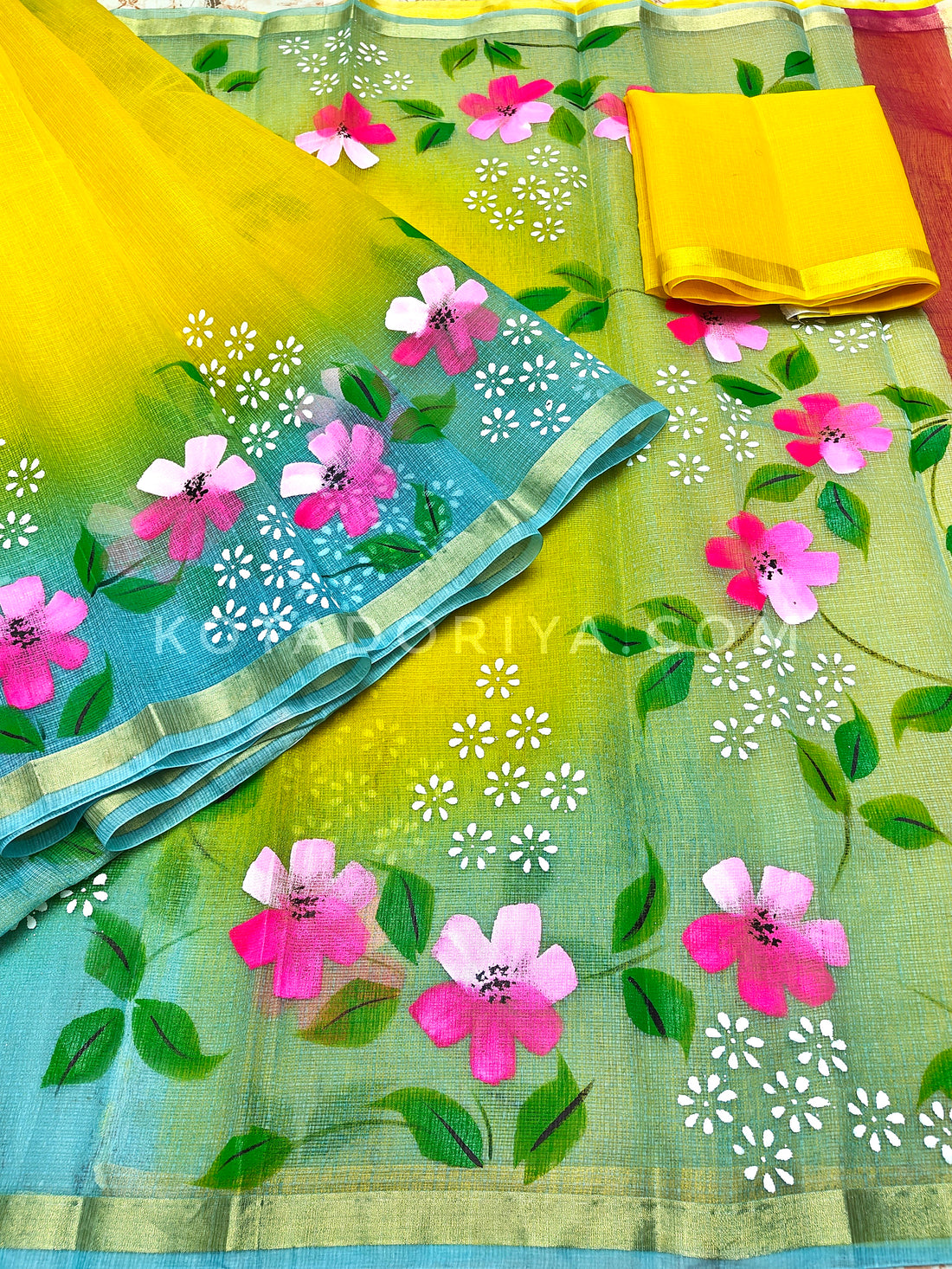 Yellow Cotton Kota Doria Hand Painted Saree With Sea-green Border & Contrast Blouse Piece.