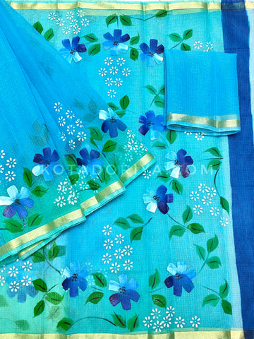 Sky-blue Cotton Kota Doria Hand Painted Saree With Sea-green Border & Contrast Blouse Piece.